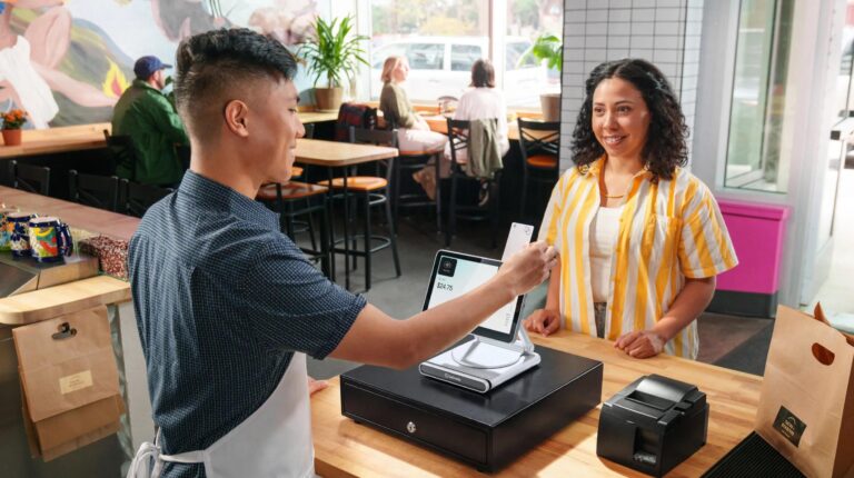 Illustration of servers and charts with two hands in a handshake.