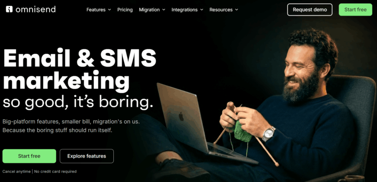 Nonprofit email marketing: A bearded man smiles while knitting and using a laptop. Large white text says Email & SMS marketing so good, it’s boring. The website header and buttons are also visible.
